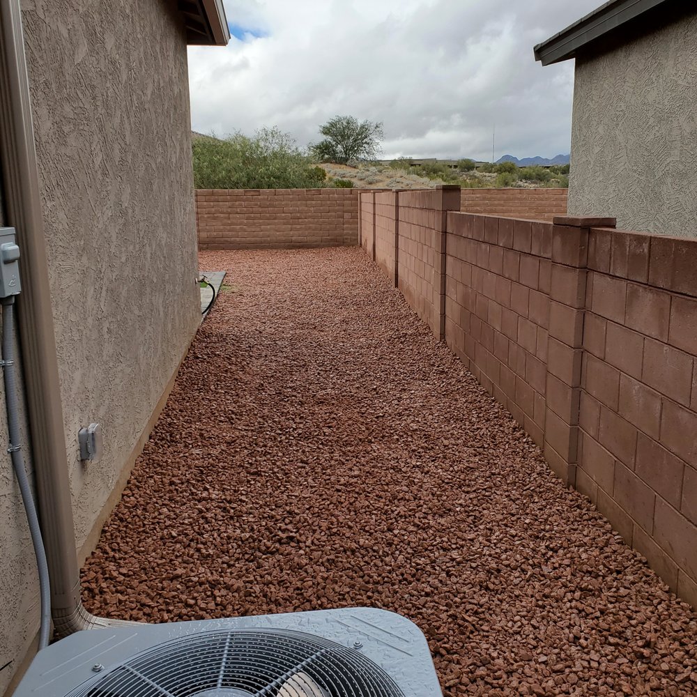 GreenLife Tree & Landscaping - an air conditioner outside a home - Landscaping Near Me - Tucson, Arizona