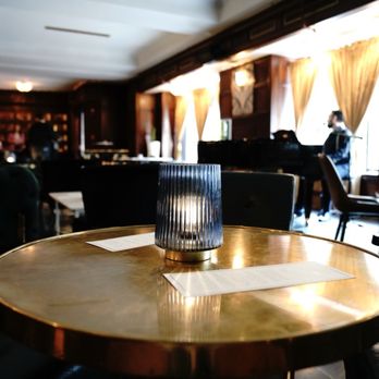 VOO Lounge - a glass of water on a table - Lounges Near Me - Kansas City, Missouri