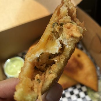 Guaiqueri Empanadas - Inside of chicken & cream cheese empanada (weekend special) - Venezuelan Near Me