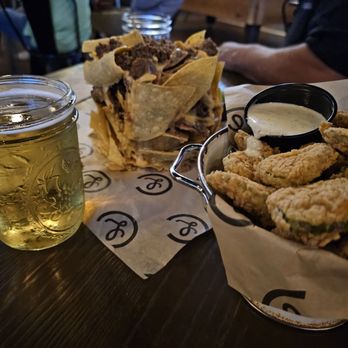 Lucy Cooper's Ice House - Tin Can Nachos and fried pickles - Bars Near Me - San Antonio, Texas