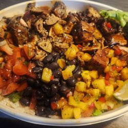 Ordered the buy one get one free jerk chicken bowl from door dash. Good flavor and spice.