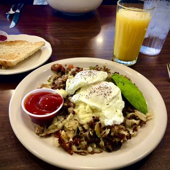 Flat Tire Diner - Supreme Skillet with poached eggs & fresh squeezed OJ. - American Near Me - Old Hickory, Tennessee Flat Tire Diner - Supreme Skillet with poached eggs & fresh squeezed OJ. - American Near Me - Old Hickory, Tennessee