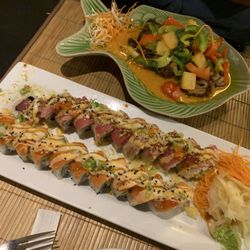 Sushi rolls and roasted duck curry