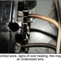 360 Property Inspections - Scorched wire on breaker. This is a safety hazard!
