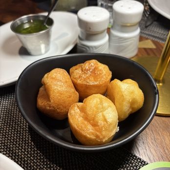 Fogo de Chão Brazilian Steakhouse - cheese balls - Brazilian Near Me - Gilbert, Arizona Fogo de Chão Brazilian Steakhouse - cheese balls - Brazilian Near Me - Gilbert, Arizona