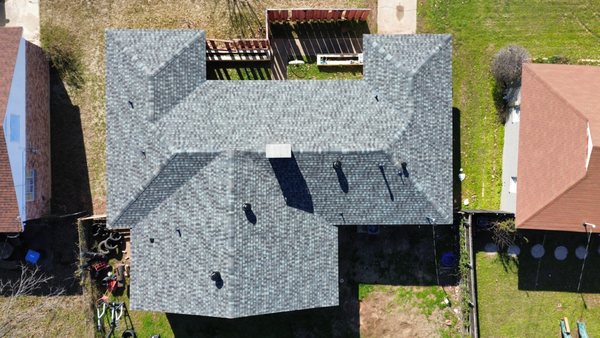 Uptown Roofing & Co Logo