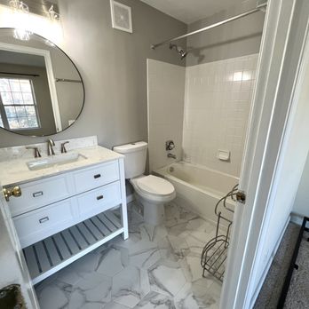 DLF Contractor - a bathroom with a marble floor - General Contractors Near Me - Springfield, Virginia DLF Contractor - a bathroom with a marble floor - General Contractors Near Me - Springfield, Virginia