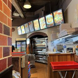 Paisano's Pizzeria - Real ovens, no conveyor belts.