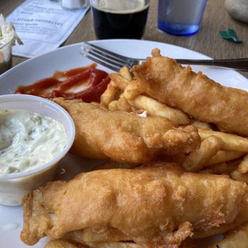 Hofbrau - 4 large pieces of fried fish and a ton of fries. Slaw and tartare sauce included. - American Near Me - Interlochen, Michigan
