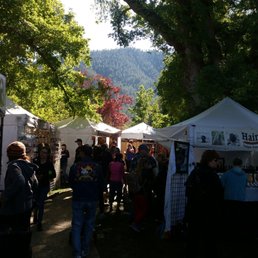 A view of the craft tents with a view of the mountains. A view of the craft tents with a view of the mountains.