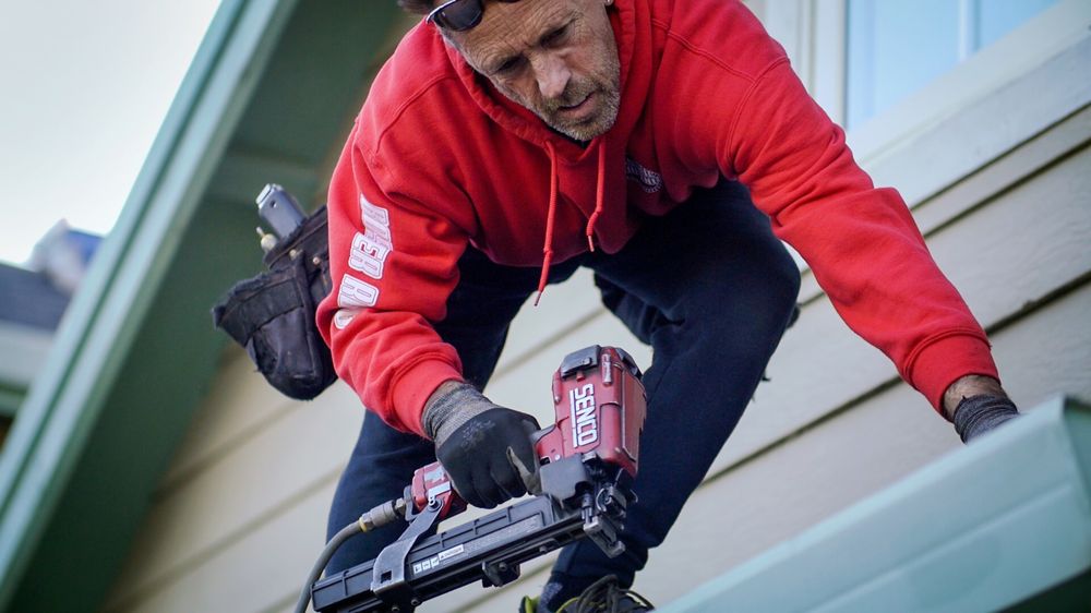 Slide of Boster Roofing