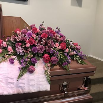 Garner's Flowers - They make this casket arrangement so special! - Florists Near Me - Collinsville, Oklahoma
