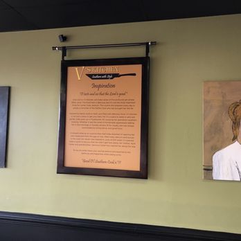 V's Kitchen - a woman's face on a wall - American Near Me - Durham, North Carolina