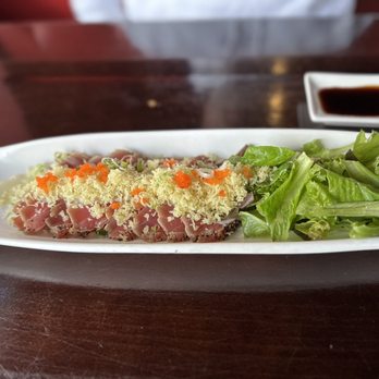 W-Tao Sushi - a plate of food on a table - Japanese Near Me - Des Moines, Iowa W-Tao Sushi - a plate of food on a table - Japanese Near Me - Des Moines, Iowa