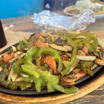 Taco Libre - a plate of vegetables on a table - Tacos Near Me - Jacksonville, Florida