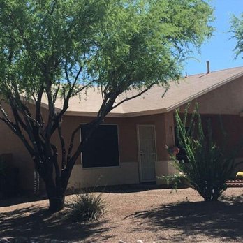 Trees R Us - the front of a house - Tree Services Near Me