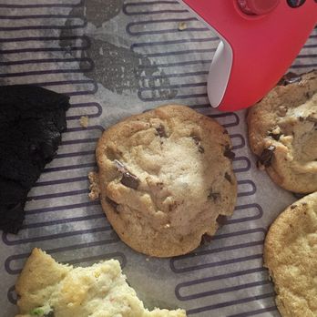 Insomnia Cookies - The size of the cookies next to my xbox controller. You can also kind of see the greasiness. - Desserts Near Me - Berkeley, California Insomnia Cookies - The size of the cookies next to my xbox controller. You can also kind of see the greasiness. - Desserts Near Me - Berkeley, California