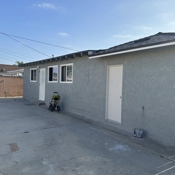 Efficient Construction - Back wall and replaced door. - Roofing Near Me - Gardena, California