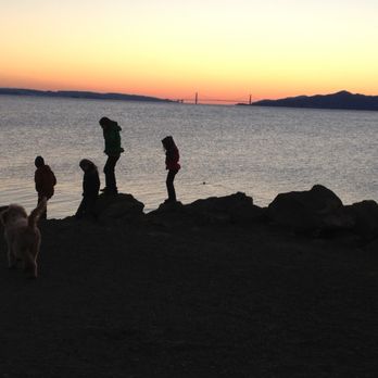 Point Isabel Regional Shoreline - Dog and kid play date at dusk - Dog Parks Near Me - Richmond, California Point Isabel Regional Shoreline - Dog and kid play date at dusk - Dog Parks Near Me - Richmond, California