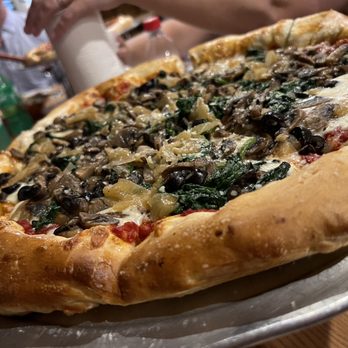 Another Slice - a whole pizza on a plate - Pizza Near Me - Saint Helena Island, South Carolina
