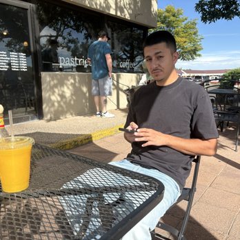 The French Press - Some good look kid sitting on the patio - - Cafes Near Me - Aurora, Colorado The French Press - Some good look kid sitting on the patio - - Cafes Near Me - Aurora, Colorado