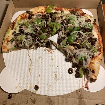 Baci's Pizza & Pasta - Half way through and we knew we needed a Yelp posting so we paused and captured this picture!  SOOOO GOOOOOD. - Pizza Near Me - Rogue River, Oregon