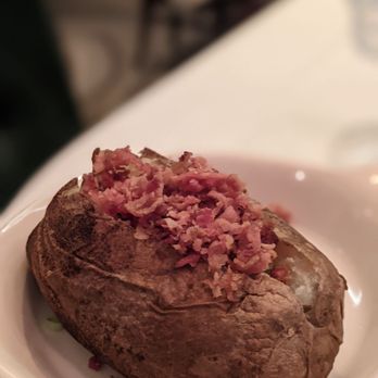 Hy's Steak House - Baked potato, they walk around with the topping. I loaded it with bacon - Steakhouses Near Me - Honolulu, Hawaii