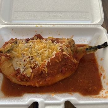 Tacos Mi Carreta - Chile Relleno - Roasted poblano pepper stuffed w/ cheese, then coated in a fluffy egg batter, fried until golden brown served w/ red sauce. - Mexican Near Me - San Bernardino, California Tacos Mi Carreta - Chile Relleno - Roasted poblano pepper stuffed w/ cheese, then coated in a fluffy egg batter, fried until golden brown served w/ red sauce. - Mexican Near Me - San Bernardino, California