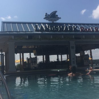 Landshark Pool Bar - people relaxing in the pool - Bars Near Me - Tulsa, Oklahoma Landshark Pool Bar - people relaxing in the pool - Bars Near Me - Tulsa, Oklahoma