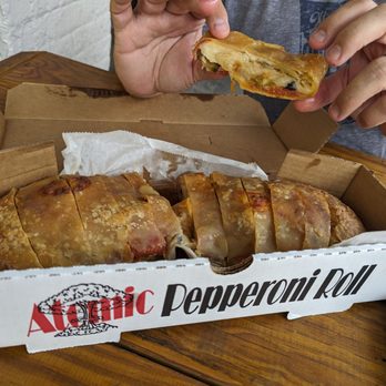 Sunseri Jimmy & Nino - The atomic pepperoni roll. Not very spicy but a good variety of peppers. - Italian Near Me - Pittsburgh, Pennsylvania Sunseri Jimmy & Nino - The atomic pepperoni roll. Not very spicy but a good variety of peppers. - Italian Near Me - Pittsburgh, Pennsylvania