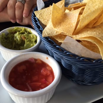 FL Cafe - Not your average chip basket. Fresh cooked chips and house salsa & guac- - New American Near Me - Miami Beach, Florida