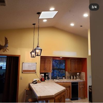 custom lighting installation - these customers wanted to ditch the old fluorescent lighting in their kitchen.  we installed recessed lighting and 2 pendant lights. they were so happy with the installation and have since called us back to do more work for them.