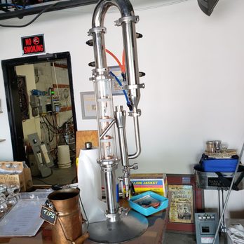 Cotherman Distilling - a distilling machine in a workshop - Distilleries Near Me - Dunedin, Florida