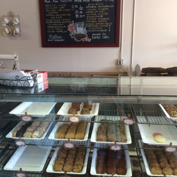 Riverside Cookie Shoppe - The list of cookies and half of the display case. - Desserts Near Me - Riverside, California Riverside Cookie Shoppe - The list of cookies and half of the display case. - Desserts Near Me - Riverside, California