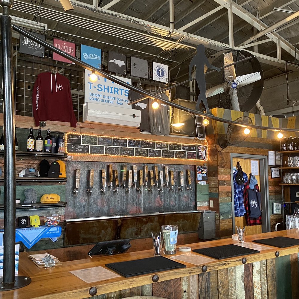 Hi-Wire Brewing - Note the new insignia above the bar - Breweries Near Me - Asheville, North Carolina Hi-Wire Brewing - Note the new insignia above the bar - Breweries Near Me - Asheville, North Carolina