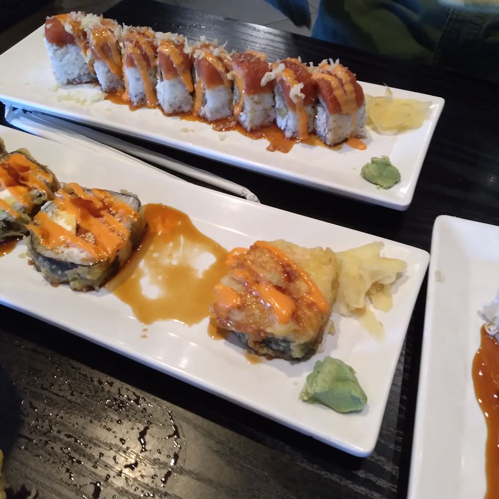 Arigato Sushi - Top: Spider-Man Roll; Bottom is: Salinas roll. - Sushi Bars Near Me - Salinas, California Arigato Sushi - Top: Spider-Man Roll; Bottom is: Salinas roll. - Sushi Bars Near Me - Salinas, California