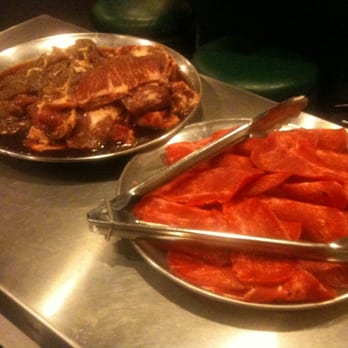 Hwang's Restaurant - Marinated beef rib and sliced beef.. Beef tongue on the right - Korean Near Me - Gardena, California Hwang's Restaurant - Marinated beef rib and sliced beef.. Beef tongue on the right - Korean Near Me - Gardena, California