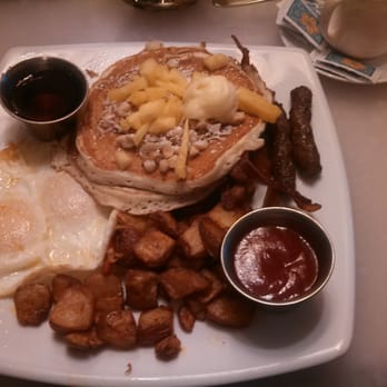 M.A.C. 24/7 - Macadamia nut coconut and pineapple pancakes to die for. - American Near Me - Honolulu, Hawaii