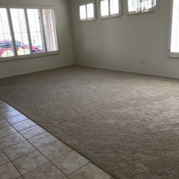 a living room with tile floor a living room with tile floor