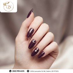 Dip Nails - Regal plum pinstripe! Sleek deep bordeaux almond nails shine with delicate metallic gold center lines and double pearl studs. Book!