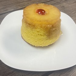 Knights Cafe - Individual pineapple upside down cake. Yummmm....Caramelized glaze draping the cake.