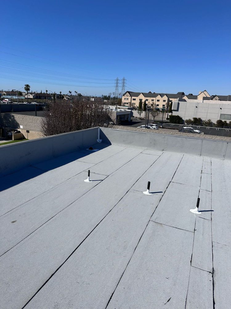 Slide of Tecun’s Roofing
