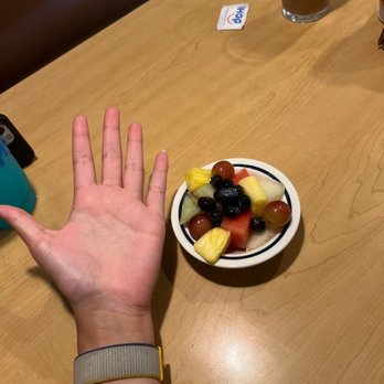 IHOP - Cup of fruit (hand for scale) - Breakfast & Brunch Near Me - Edgewater, Maryland