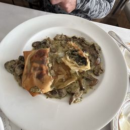 Escargot in puff pastry with mushrooms Escargot in puff pastry with mushrooms