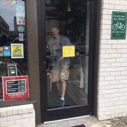 QueenCity Bicycles - Nice customer leaving who held the door open for me and my bike even though he was handling a bike of his own.