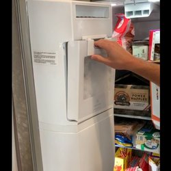 Total Appliance Service - This is how the drawer sits after replacing the auger below. They won't fix it because it's making ice. Before it was 100% flush.