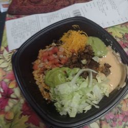 Taco John's - Teaspoon of lettuce a teaspoon of rice and a teaspoon of meat charging me $8.49 + tax it was gross