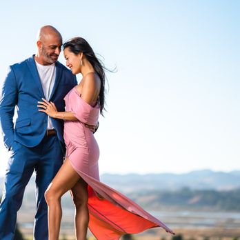 Fits and Stops Photography - A couple cuddles during their engagement session at Napa Valley, CA. - Session Photography Near Me Fits and Stops Photography - A couple cuddles during their engagement session at Napa Valley, CA. - Session Photography Near Me