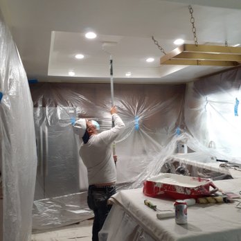 JM Construction - a man working on a ceiling - General Contractors Near Me - Campbell, California JM Construction - a man working on a ceiling - General Contractors Near Me - Campbell, California