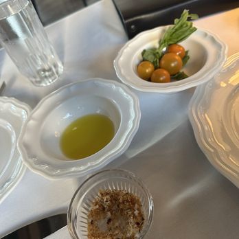 Marisella - Amuse bouche (fresh cherry tomatoes and basil, olive oil, and seasoned salt) - Italian Near Me - Santa Barbara, California Marisella - Amuse bouche (fresh cherry tomatoes and basil, olive oil, and seasoned salt) - Italian Near Me - Santa Barbara, California